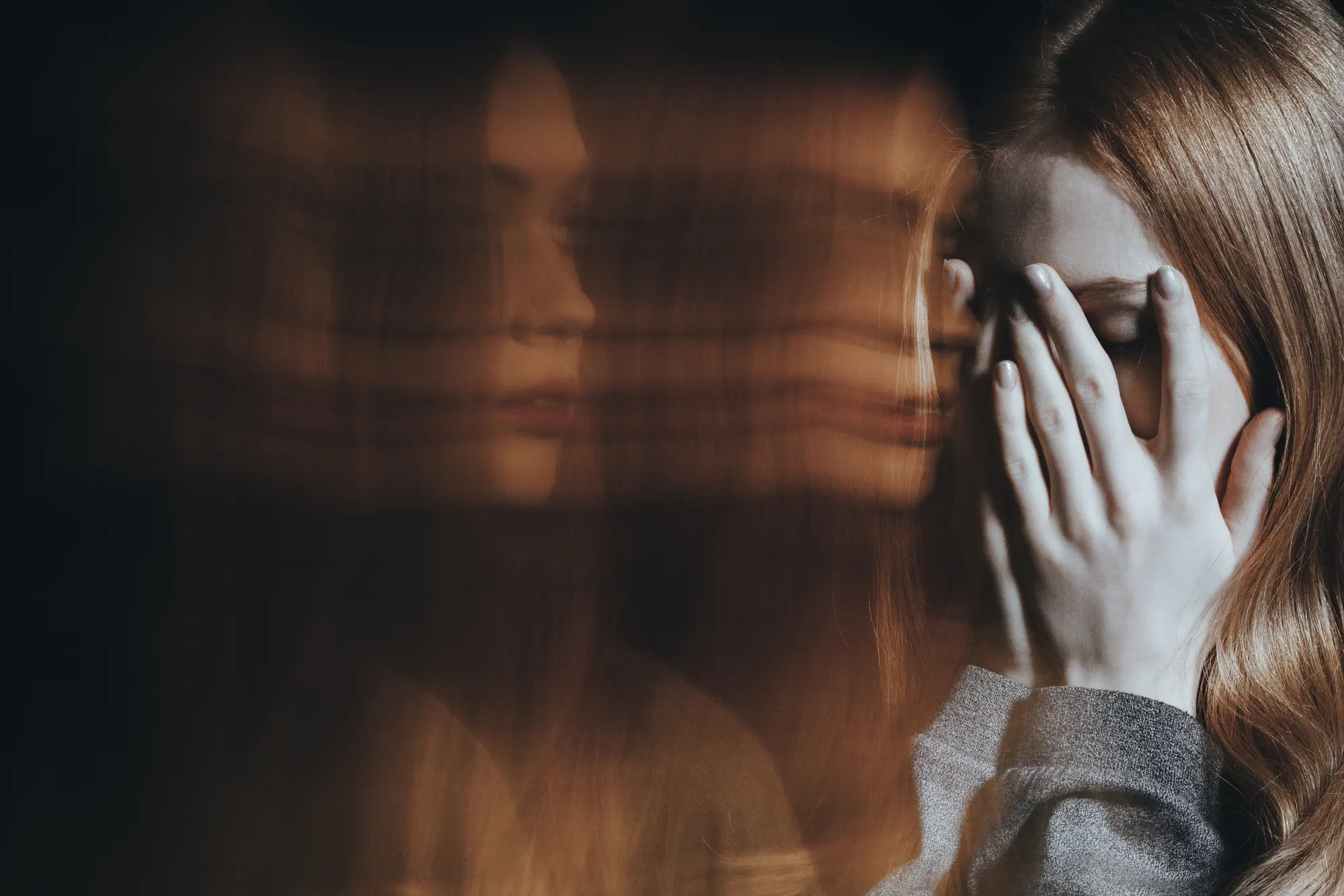 Blurred background and young girl with schizophrenia and mental disorder crying